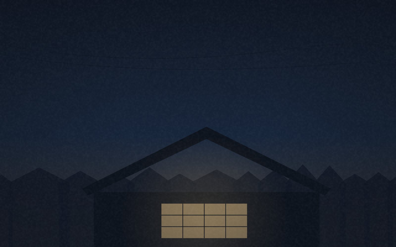 夕暮れに灯りのともる日本の住まい